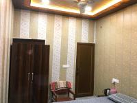 Chambre Double Deluxe (2 Adultes + 1 Enfant)