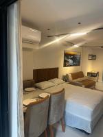 One-Bedroom Apartment with Balcony and City View