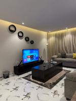 غرفه وصاله انيقه بمدخل ذكي حي العقيق - B&B