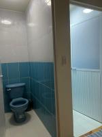 Camera Doppia con Letti Singoli e Bagno in Comune