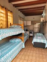 Kitnet com quarto de casal na rua da praia - B&B