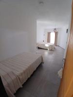 One-Bedroom Apartment with Balcony and City View
