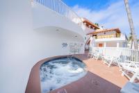 10-Star Property! Premium Ocean Views, Immaculate Corner Condo with Fireplace, New Golf Cart - B&B Avalon