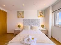 Zimmer mit Queensize-Bett und Meerblick