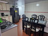 Habitación baño privado garaje moto, Manizales - Chambres d'hôtes Manizales
