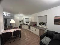 Moderne Ferienwohnung Green Garden mit Garten und Stellplatz - B&B