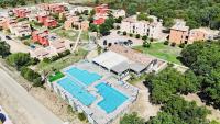 Joli T2 climatisé au calme à 10 mm de Porto-Vecchio dans une résidence de tourisme - Chambres d'hôtes Lecci
