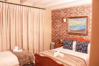Chambre Lit Queen-Size Deluxe