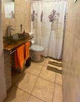 Vierpersoonskamer met Uitzicht op de Tuin.