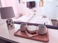 Kamer met Queensize Bed en Uitzicht op de Tuin