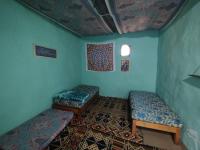 Cama en habitación compartida con 4 camas