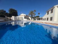 Can Alfredo, Apartamento Cala en Bosch con piscina, terraza y jardín privado - Chambres d'hôtes Cala'n Bosch