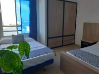 One-Bedroom Apartment with Balcony and Sea View