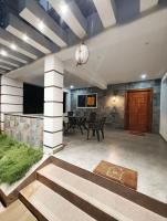 Amberleaf Estate 4BHK Homestay Coorg by Homeyhuts - Chambres d’hôtes Virajpet