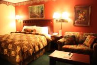 Deluxe Zimmer mit Kingsize-Bett und Whirlpool