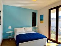 Doppelzimmer mit Balkon und Meerblick