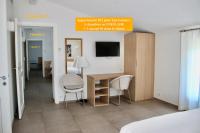 Appartamento su 2 Livelli con 3 Camere da Letto e Giardino