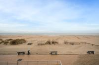 Beachfront Luxe - Stijlvol app met frontaal zeezicht - Bed and Breakfast