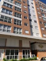Apartamento perto do mar com piscina e rede de proteção - Bed and Breakfast