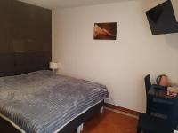 Doppel- oder Zweibettzimmer