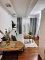 Apartament Centrum SIGMA - Chambres d’hôtes