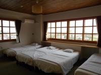 Chambre Quadruple Standard avec Salle de Bains Commune