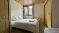 Dreibettzimmer mit Bergblick