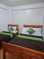 Chambre Lits Jumeaux avec Toilettes Communes