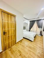 Three-Bedroom Premium Apartment with Balcony