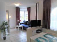 Apartment mit 1 Schlafzimmer, einem Balkon und einer Terrasse
