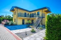 Przyjazna Osada - Domki i Apartamenty - B&B Darłowo