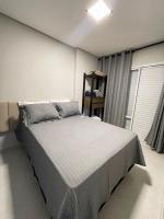 Refúgio Perfeito no Boqueirão: Apartamento Moderno a 100m da Praia com Sacada Gourmet e Piscina! - B&B Praia Grande
