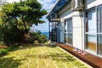 美ら海水族館近く本部町の綺麗な海を眺める1棟貸UnclesHouse海の宿 - B&B