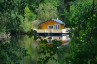 Chalet flottant sur lac et spa - Bed and Breakfast