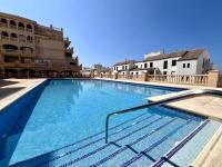 Apto luminoso con vistas al golf y playa, con parking - Chambres d’hôtes