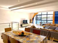 Three-Bedroom Apartment with Sea View