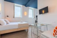 Studio équipé côté rue, parking gratuit - B&B