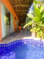 Quarto e sala com piscina em Maceió - Villas Tulipa 02 - B&B