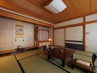 Chambre Quadruple avec Salle de Bains Commune