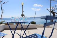 Charaki Escape Chic Studio with Seafront Patio - B&B