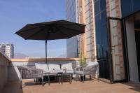 Modern 1-Bedroom Retreat with 35sqm Terrace, Overlooking Rudaki Park, City Skyline and Mountain Views - Bed and Breakfast