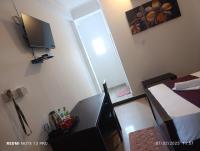 Doppel-/Zweibettzimmer mit Balkon