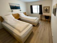 Doppel- oder Zweibettzimmer mit Zugang zum Whirlpool und zur Sauna