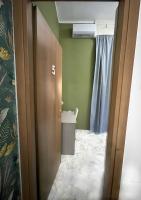 Chambre Lits Jumeaux avec Salle de Bains Commune