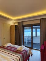 Chambre Double avec Balcon (2 Adultes + 1 Enfant)