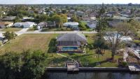 Great for families! Games & electric heated pool w/Gulf Access! Villa Mahana - SWFL Rentals - Chambres d'hôtes Cape Coral