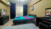 Уютная однокомнатная квартира в Алматы - Chambres d'hôtes Almaty