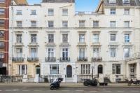 Chic 2BR Loft-Style Apartment in Queensway - Chambres d’hôtes Londres