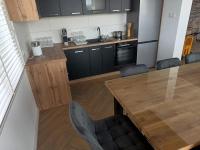 Apartamenty Noclegowe U Bartosza - B&B Odrzechowa