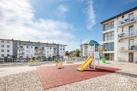 Apartament LightHouse -Słoneczne Tarasy Dziwnówek-SANNEL Apartments for rent - Chambres d'hôtes Dziwnówek